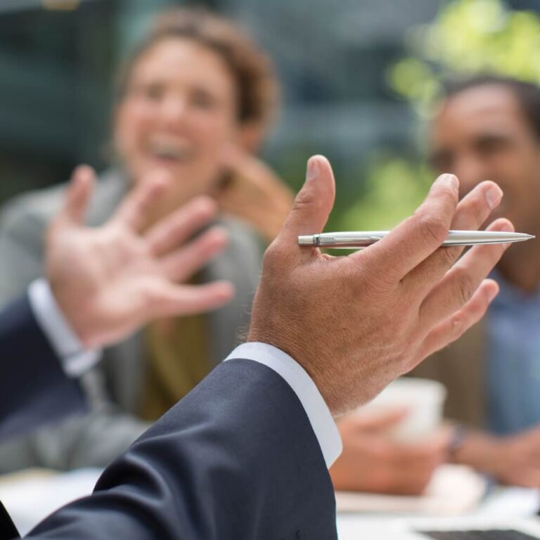 Strategic advisory meeting with focus on leadership, insight, and business decisions.